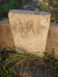 Tombstone of  (WANG2) family at Taiwan, Jinmenxian, Jinningxiang, Jincheng graveyard behind Jinjiu Gongsi. The tombstone-ID is 23855; xWAAmAӶAbsqAmӸOC