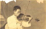 學生時期練小提琴的鄧雨賢